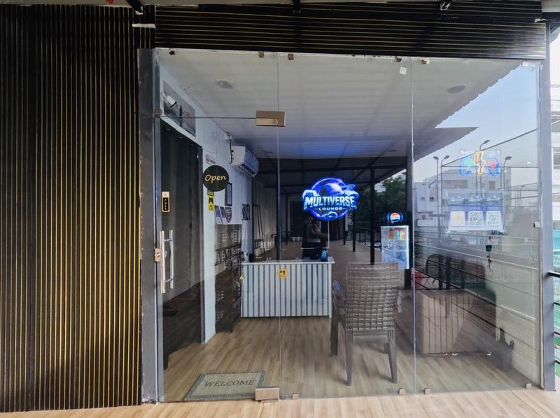 Multiverse Lounge entrance with neon sign